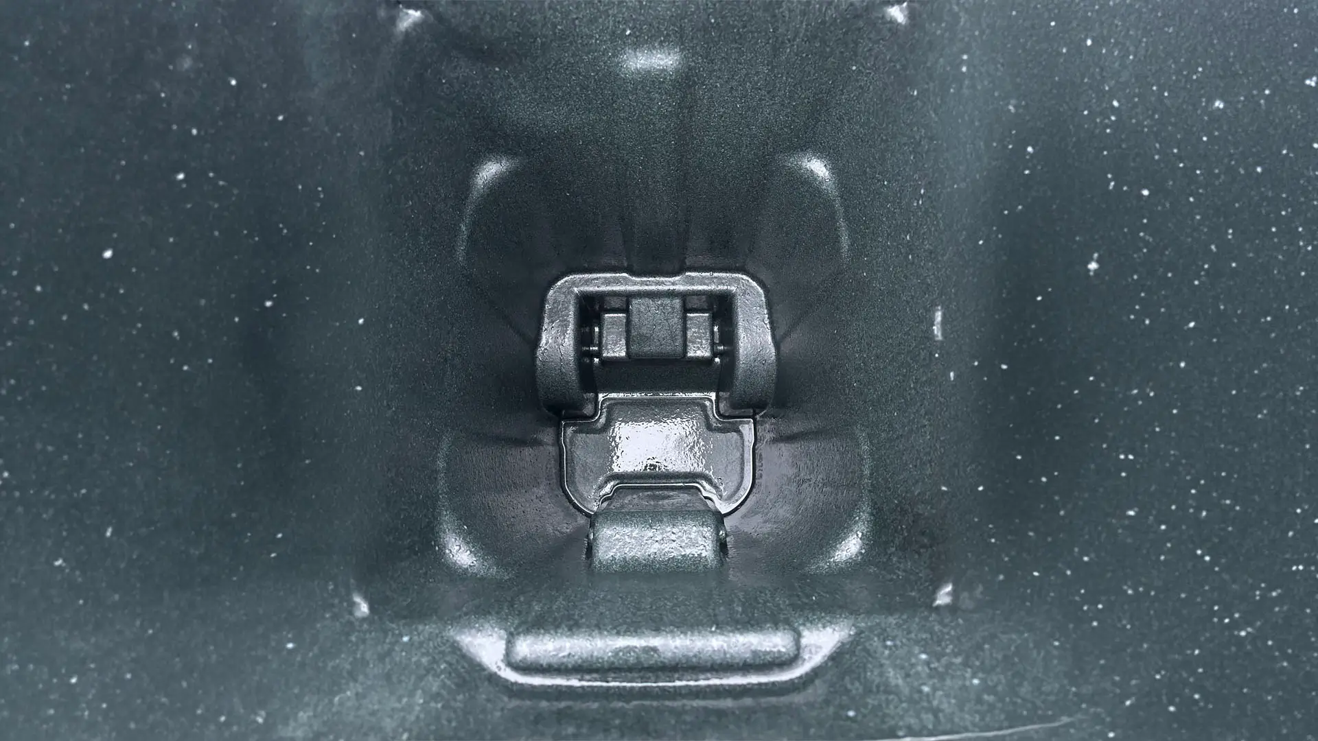 A view of the interior of a empty black trashcan bin.